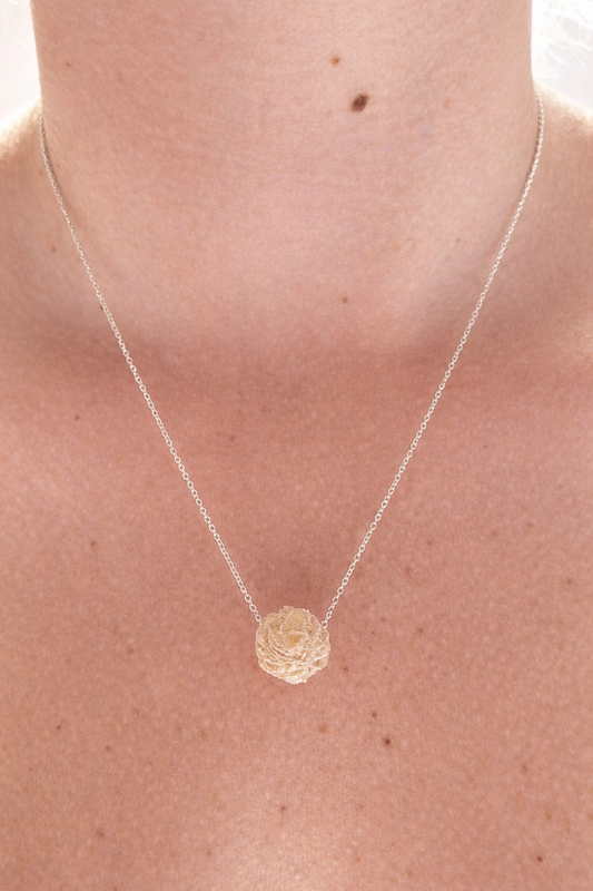 Desert Rose crystal necklace on delicate sterling silver chain worn on the neck